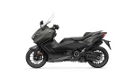 Side view of a matte gray Yamaha sport motorcycle with windshield and black accents, shown from the left.