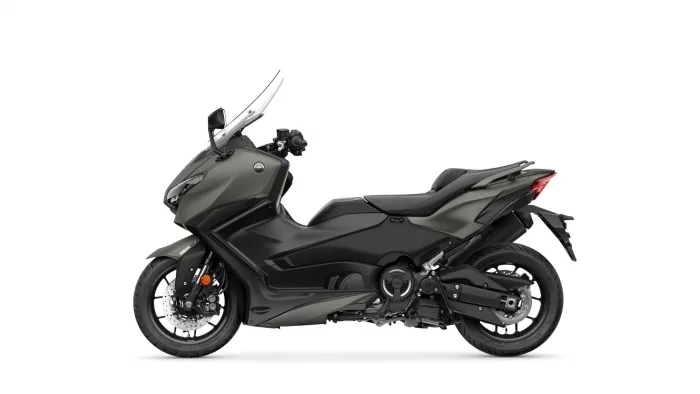 Side view of a matte gray Yamaha sport motorcycle with windshield and black accents, shown from the left.