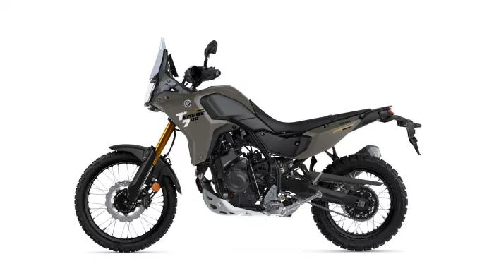 Yamaha Tenere 700 adventure motorcycle shown from the left side with olive bodywork and tall windshield