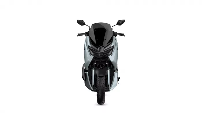 Front view of a silver and black sport motorcycle with a dark windshield and twin headlights