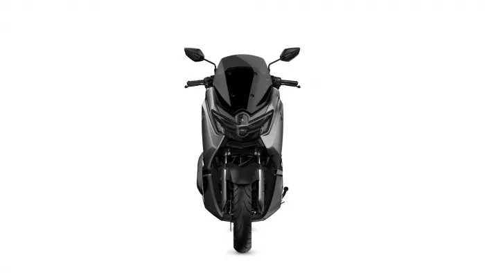 Front view of a modern black-gray sport motorcycle against a white background, showing the headlights and aerodynamic fairing.