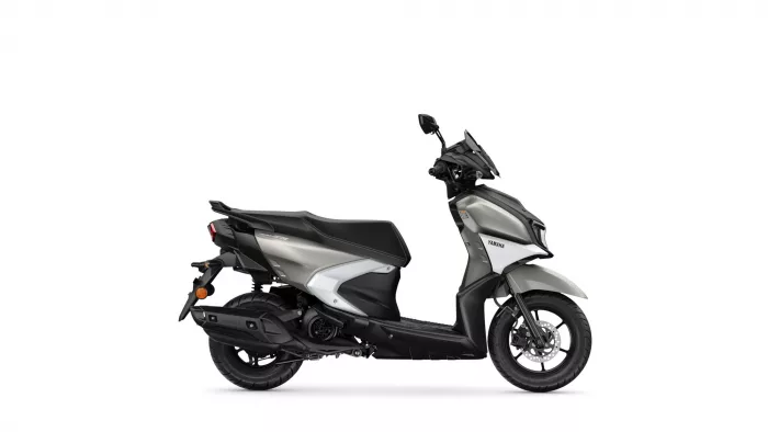 Side view of a silver and black Yamaha scooter, showing the seat, fairing, and front wheel on a white background.