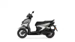 Side view of a Yamaha scooter in grey and black, showing the front wheel, seat, and rear at left to right.