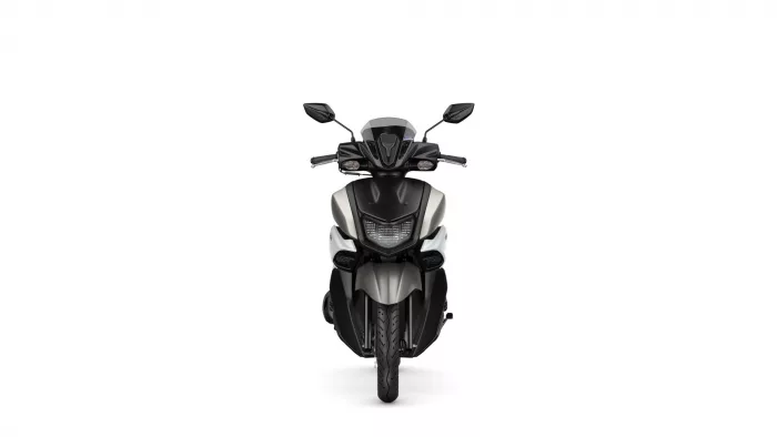 Front-facing view of a black-and-silver motorcycle with handlebars and mirrors visible