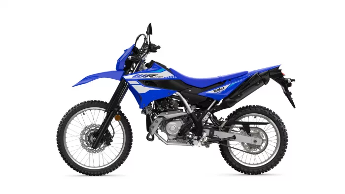 Blue Yamaha dirt bike shown from the left side, highlighting the chassis and knobby off-road tires (WR125R).