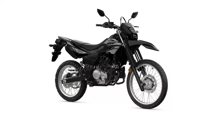 Black Yamaha dual-sport motorcycle shown from the left-front side with knobby tires and exposed engine