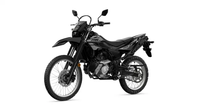 Black Yamaha dual-sport motorcycle shown in a three-quarter front-left view with knobby off-road tires and rugged styling on a white background, front disc brake visible.