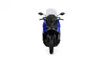 Front view of a blue and black sport motorcycle with a tall windshield and angular headlights, seen head-on against a white background.