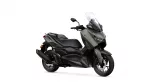 Modern gray Yamaha scooter, viewed from the front-right with tall windshield and black seat
