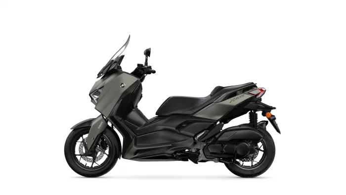 Side view of a gray Yamaha XMAX scooter with a windshield, shown on a white background