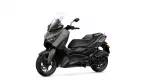 Yamaha sport-touring motorcycle with a tall windshield and matte olive-green body, shown from the front-left side
