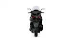 Rear view of a black sport motorcycle with a clear windscreen on a white background