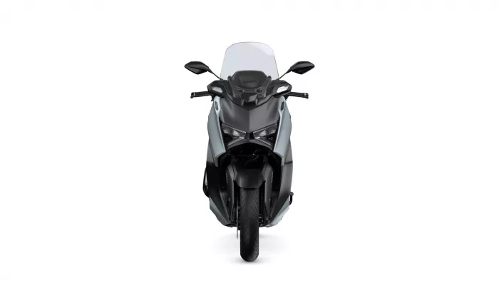 Front view of a gray and black sport motorcycle with a tall windshield and dual headlights.