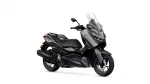 Gray Yamaha XMAX sport scooter with a tall clear windshield mounted on the front