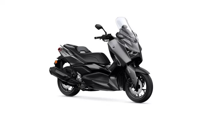 Gray Yamaha XMAX sport scooter with a tall clear windshield mounted on the front
