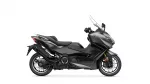 Left-side view of a black Yamaha TMAX sport scooter with a tall clear windshield.
