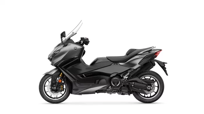 Grey Yamaha Tmax sport scooter shown from a left-front side angle with a windshield against a white background.