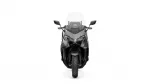 Front view of a grey sport motorcycle with angular fairings, twin headlights, and a tall windshield.