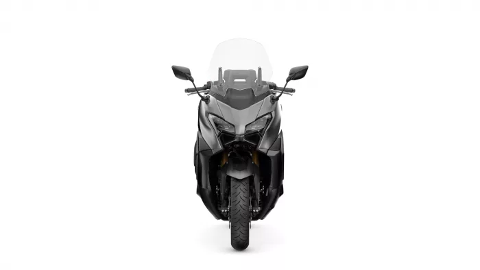 Front view of a grey sport motorcycle with angular fairings, twin headlights, and a tall windshield.