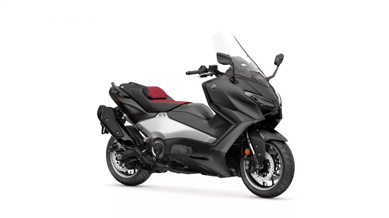 Black Yamaha sport-touring scooter with red seats and windshield, angled to show side and front profile
