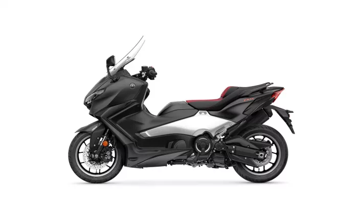 Side view of a black Yamaha TMAX scooter with a red-accented seat, shown against a white background.