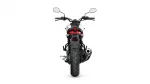 Rear view of a black-and-red motorcycle on a white background, showing taillight, mirrors, and exhaust on the right side.