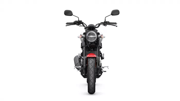 Front view of a black Yamaha motorcycle with a round headlight, dual mirrors, and a red front fender against a white background.