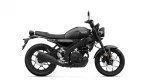 Black Yamaha motorcycle viewed from the left side, showing the fuel tank, seat, and exhaust system, on a white background.