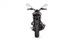 Rear view of a black sport motorcycle on a white background, showing the red taillight, wide rear tire, mirrors, and exhaust on the right.