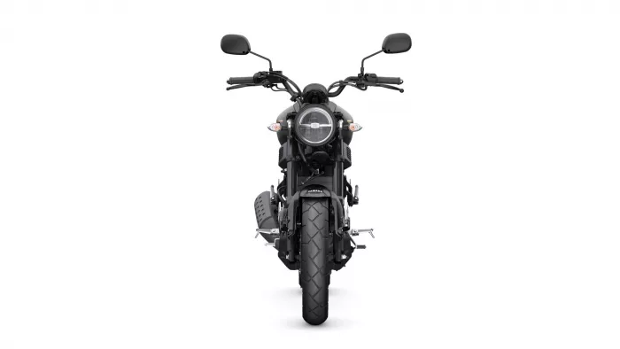 Front view of a black Yamaha motorcycle facing the camera, headlight centered and handlebars visible above the tire's tread.