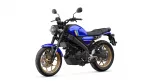 Blue Yamaha motorcycle with black frame and gold alloy wheels, angled toward the left.