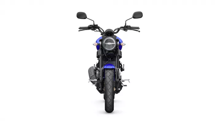 Front view of a blue Yamaha motorcycle facing the camera, with round headlight, handlebars and mirrors visible