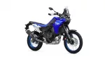 Blue Yamaha Tenere 700 adventure motorcycle viewed from a side-front angle, showing front windscreen, handlebars, and dual-sport tires