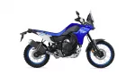 Side view of a blue Yamaha Tenere 700 adventure motorcycle on a white background, showing off-road tires and windscreen.