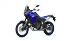 Blue Yamaha Tenere 700 adventure motorcycle shown in a side profile with a windshield and knobby tires, isolated on white.