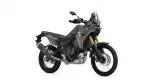 Side view of a Yamaha Tenere 700 adventure motorcycle with olive-gray body, gold front forks, and large front windscreen