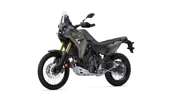 Yamaha Tenere 700 adventure motorcycle shown in a left-rear three-quarter view with olive-gray body and gold front forks against a white background (product image).