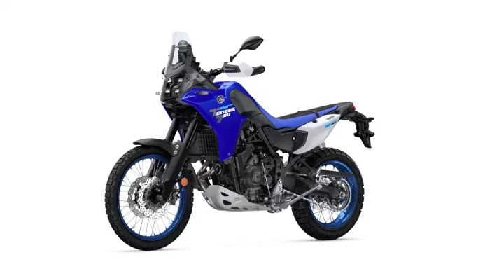 Blue Yamaha Tenere 700 adventure motorcycle shown from the side against a white background.