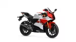 Red, white, and black Yamaha sport motorcycle shown from a front-right perspective with aerodynamic fairing and windshield in focus.