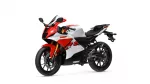 Yamaha R25 sport motorcycle in red and white, shown in a side-front angle with gold front forks and black seat.