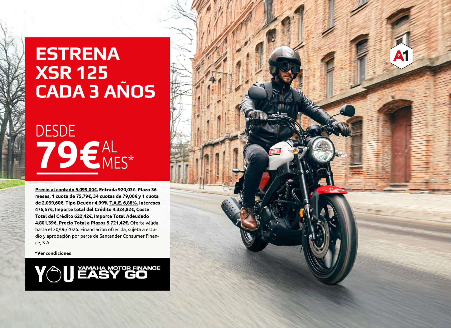 Motorcyclist wearing helmet rides a Yamaha motorcycle along a brick street beside a large red ad panel with Spanish financing text.
