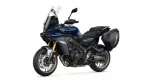 Blue Yamaha Tracer 9 GT sport-touring motorcycle with integrated side cases/panniers and tall windshield viewed from the front-left.