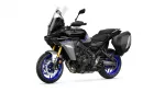 Yamaha Tracer 9 GT sport-touring motorcycle with a windscreen, black body, and blue-rimmed wheels plus side panniers