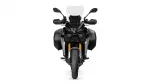 Front view of a black adventure motorcycle with side panniers and a tall windscreen