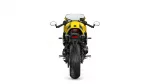 Rear view of a yellow sport motorcycle with black stripes and a wide rear tire against a white background.