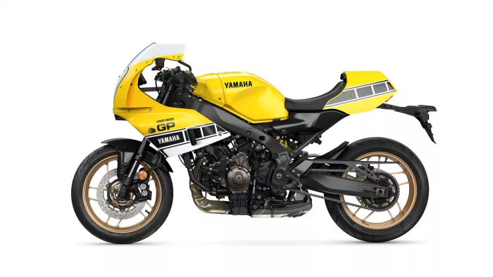 Yellow Yamaha sport motorcycle with black frame and gold rims, labeled GP and Yamaha, shown from side profile on white background