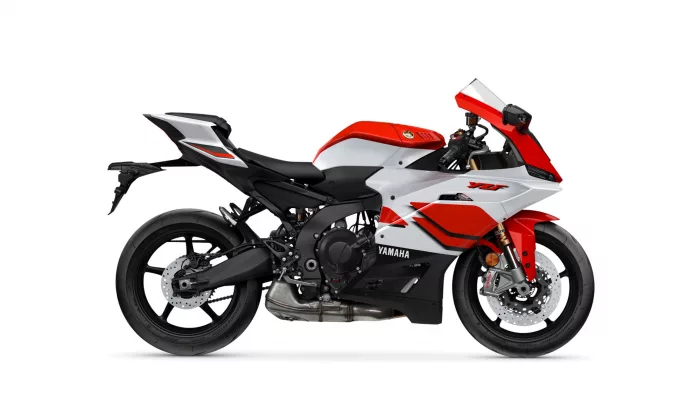 Red and white Yamaha sport motorcycle shown in a side profile with the front wheel visible.
