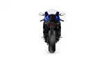 Rear view of a blue sport motorcycle on a white background, showing taillight and wide tire.
