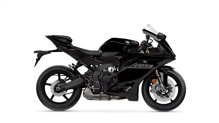 Side view of a black Yamaha R9 sport motorcycle with visible disc brakes and exhaust system.