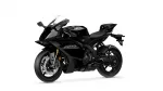 Black Yamaha sport motorcycle photographed from a front-left three-quarter view, showing its aggressive styling and glossy finish.